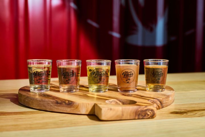 a cup of tea sitting on top of a wooden table